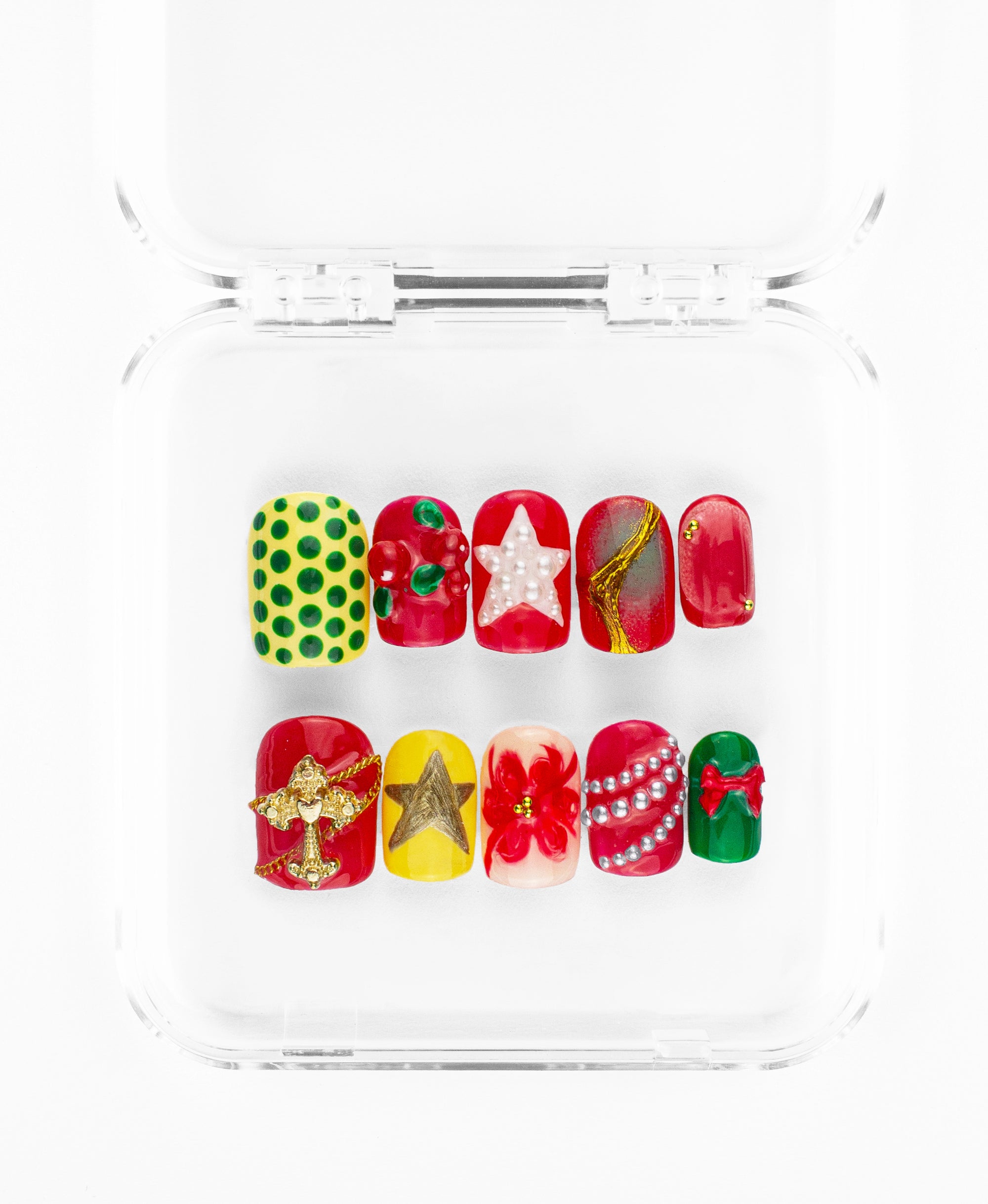 The set is packed with diverse 3D textures, including shimmering pearl-inlaid stars, realistic red berry clusters with green leaves, and an ornate gold cross charm draped with a delicate chain. From green-and-yellow polka dots to hand-painted stars and draped pearl strands, this set balances graphic patterns with opulent, three-dimensional hardware for a truly unique, state