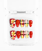 Wildflower Berries press-on set: strawberry, plaid and floral nails in red, yellow and green