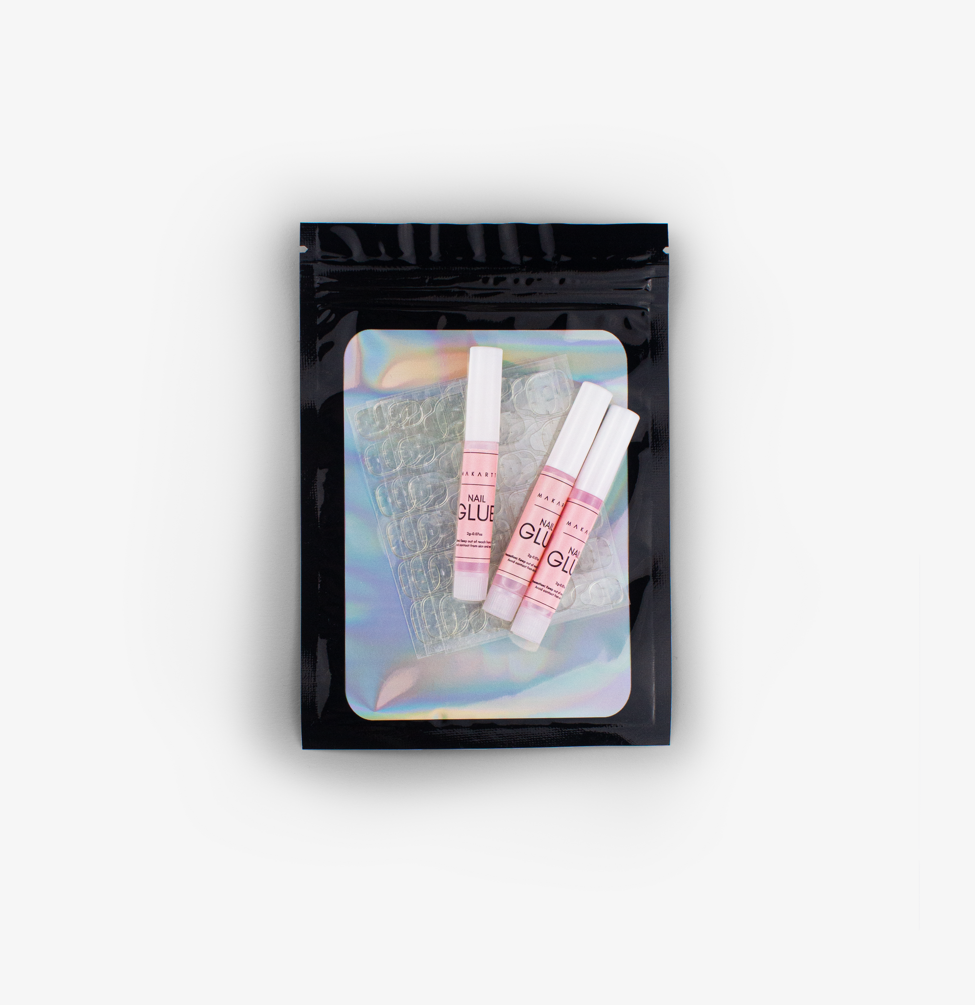 Press-on nail adhesive kit with glue and sticky tabs