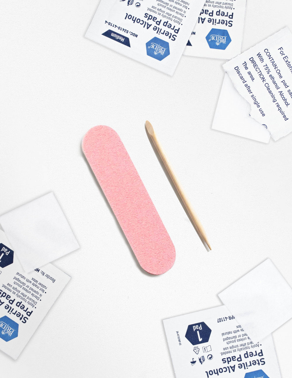 Nail file, cuticle stick and alcohol prep pads from the beoopsie application kit