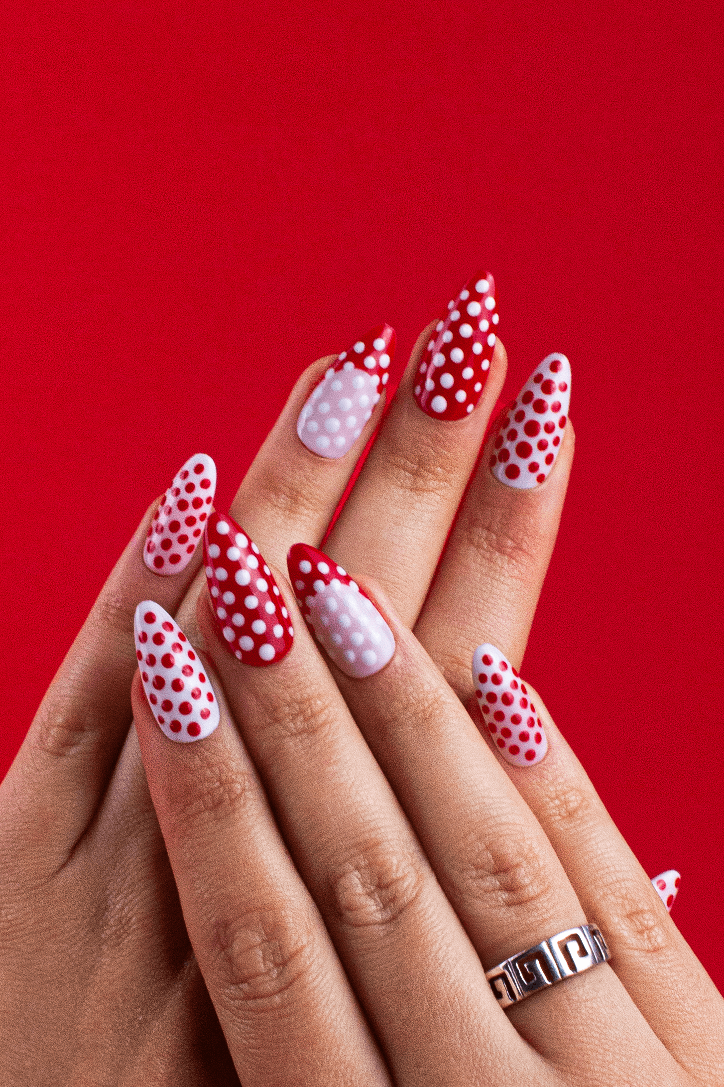 Pink polka dot press-on nails handmade in Romania Close Up